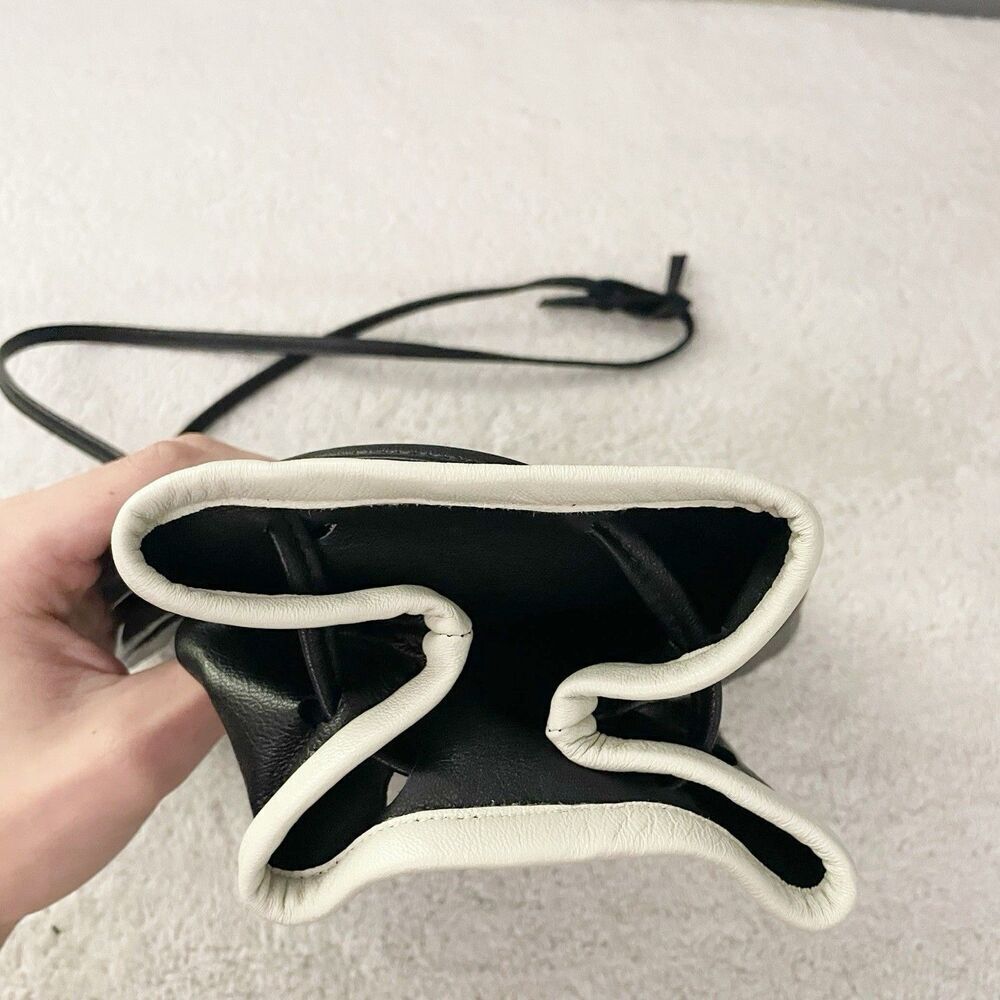 Vintage Black Leather Shoulder Bucket Drawstring Bag with White Trim Artsy 90s - Picture 3 of 9